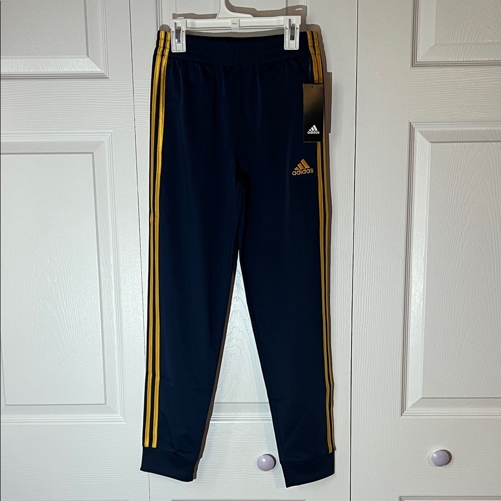 Brand new Adidas boys Joggers with Gold Stripes